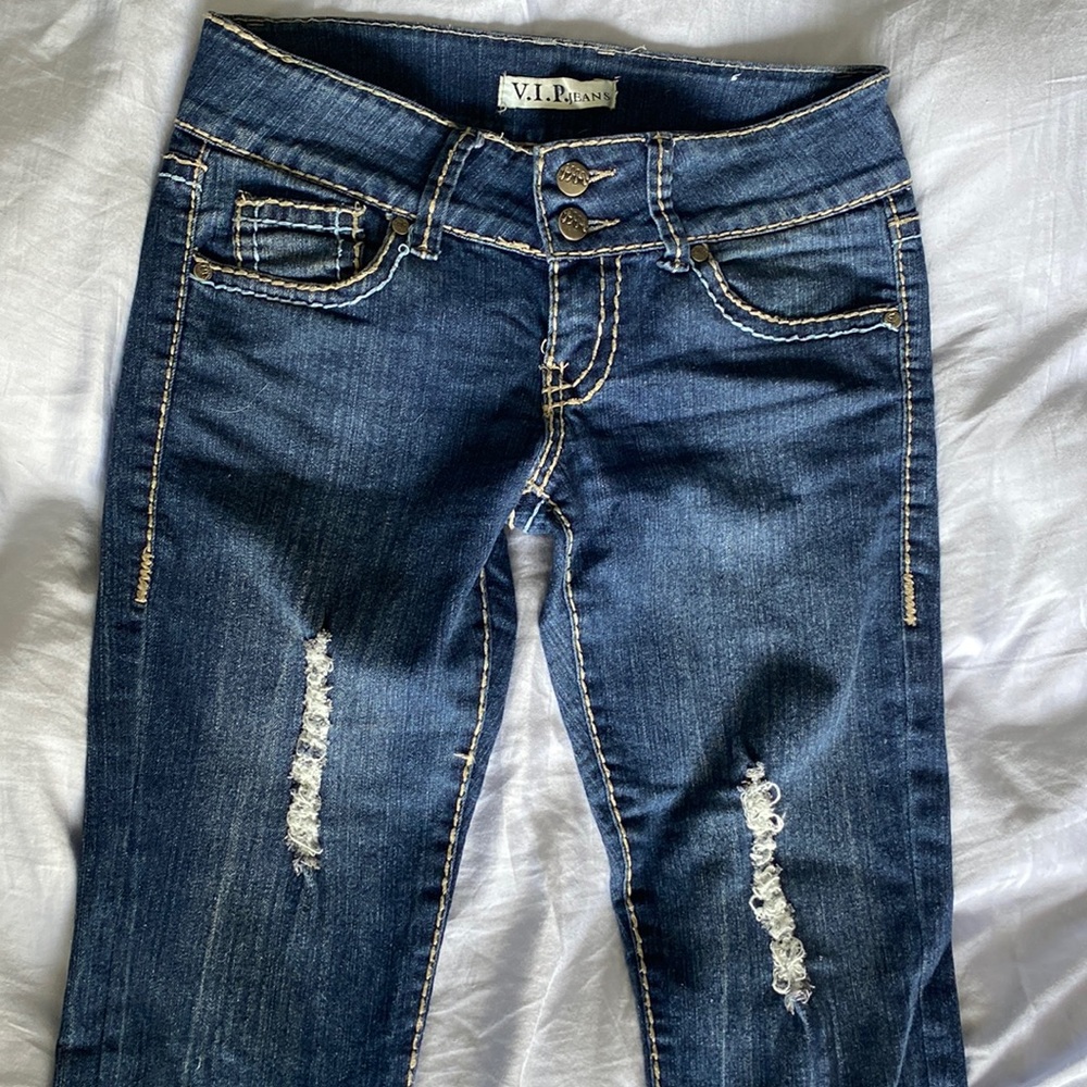 Size 3/4 dark blue jeans with stitching details